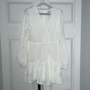 Long sleeve white dress.